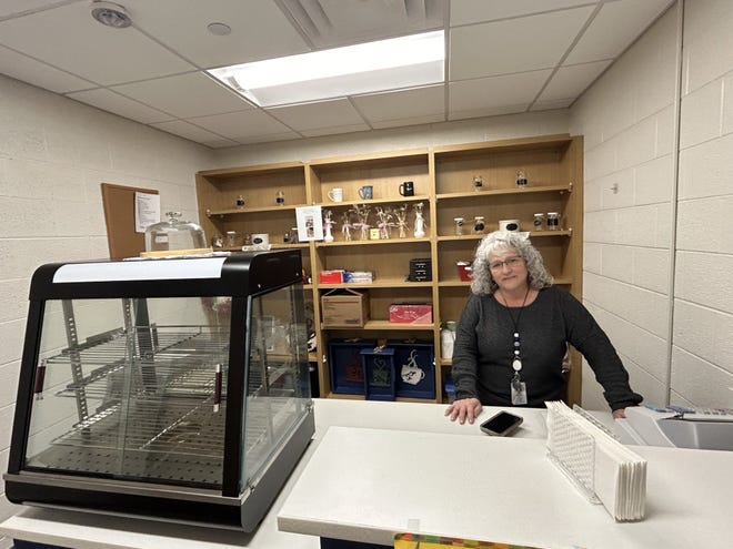 Gwendolyn Malaska stands in the Learning Center's student-run shop.
